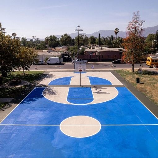 New basketball court in Los Angeles neighborhood, transformed by GAF Cool Community Project.