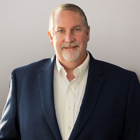 Headshot of Justin Dunlap,  President, Specialty Products & Services