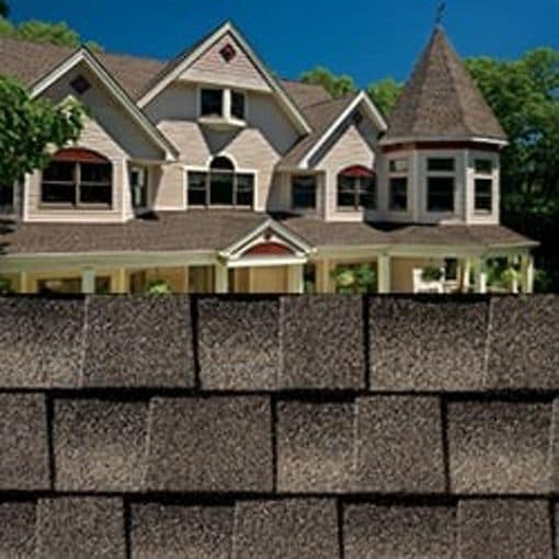 GAF Timberline HDZ mission brown shingle closeup with sample product image on a cream house.