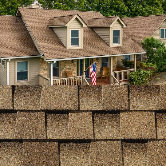 GAF Timberline HDZ® Shakewood Shingle closeup with sample product image on a light brown brick house.