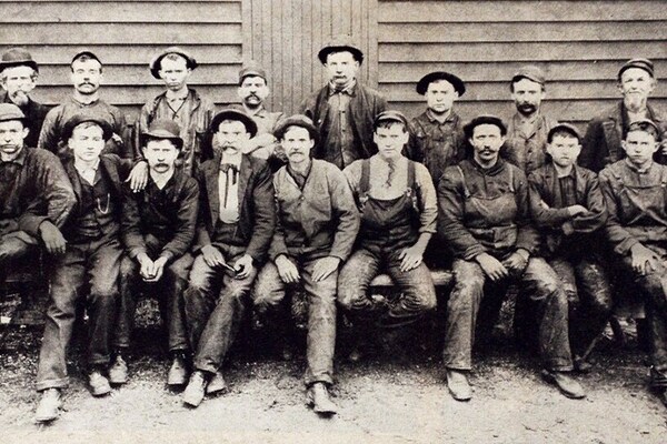 Historical photo of Standard Industries employees
