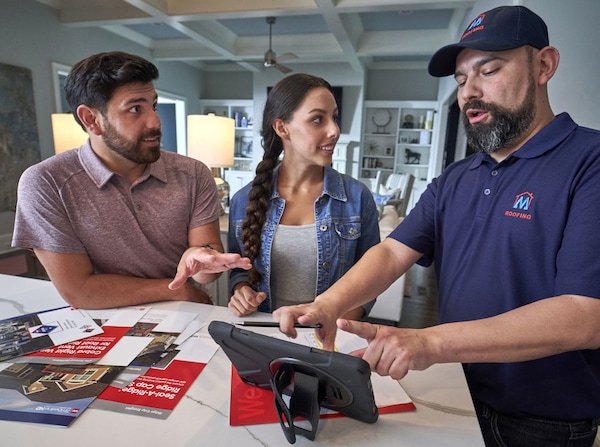 Homeowners reviewing residential warrenties