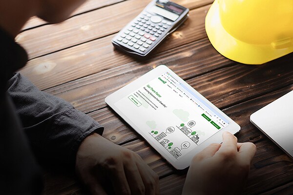 A customer looking at GreenSky’s information on a tablet. 