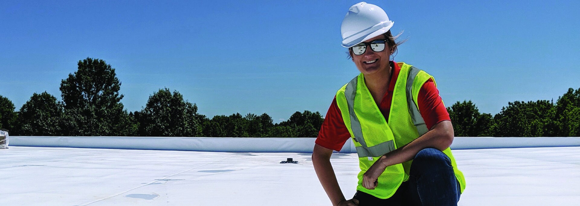 roofer on a low-slope roof