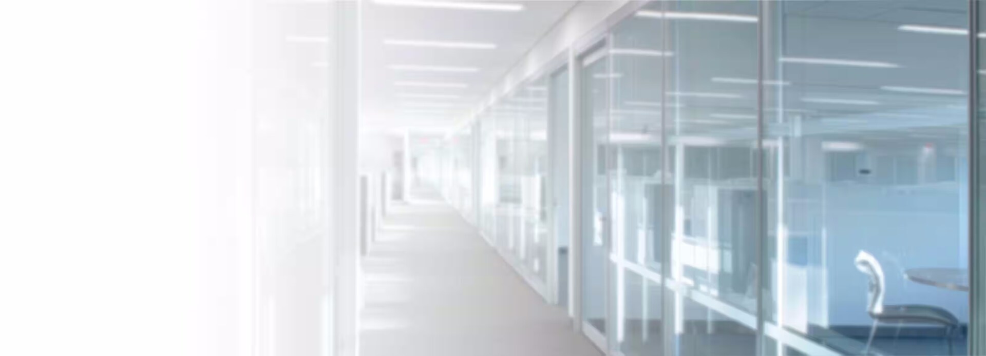 Blurred office hallway with doors