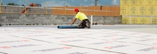 GAF certified contractors rolling out the new roof of Bozeman Public Safety Center in Montana
