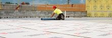 GAF certified contractors rolling out the new roof of Bozeman Public Safety Center in Montana