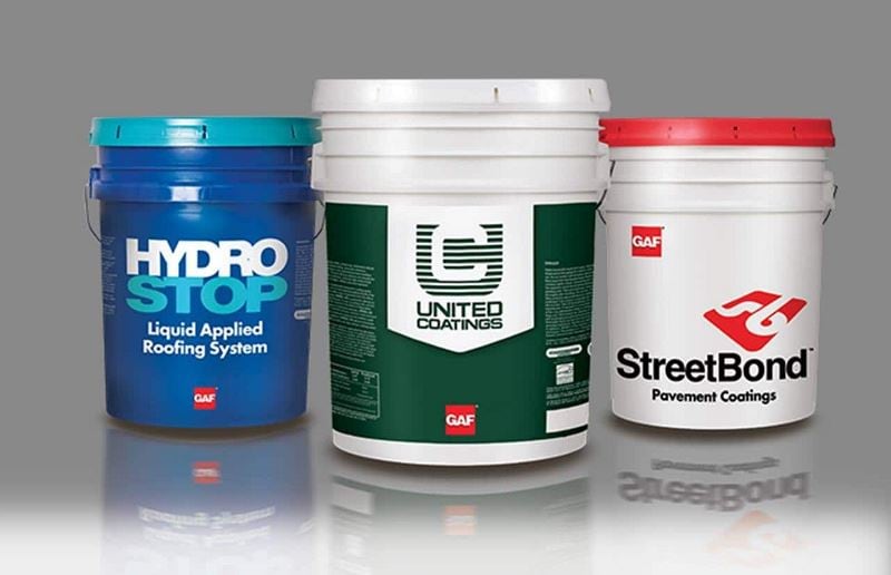 Buckets of Hydrostop, United Coatings, and StreetBond Pavement Coatings
