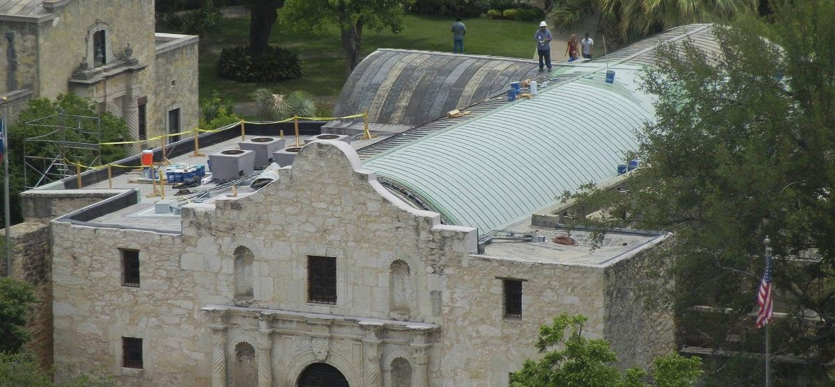 Aerial view of GAF certified contractors restoring the roof at the Alamo