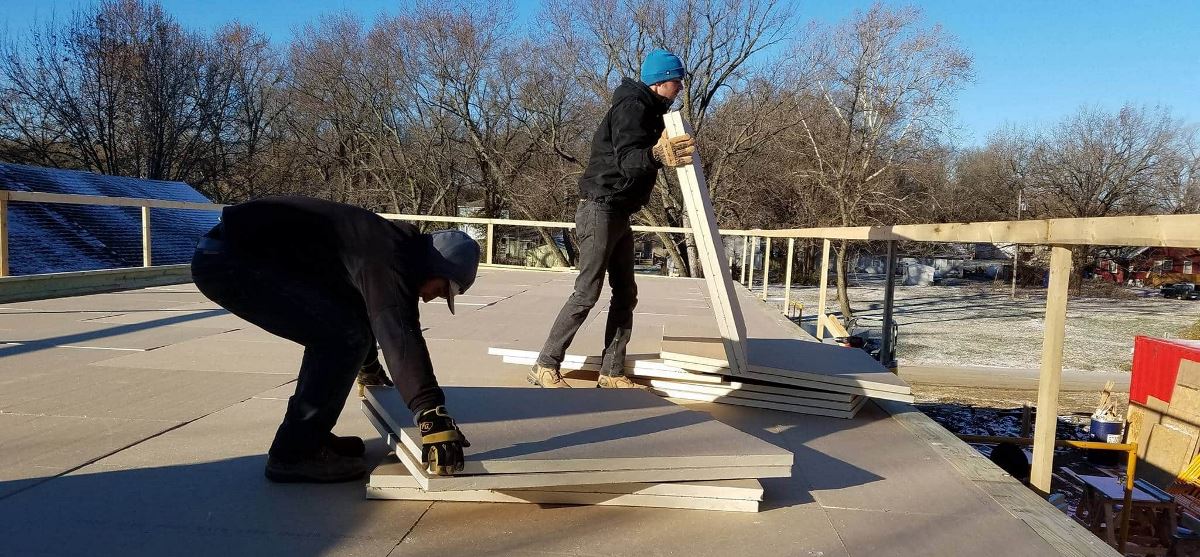 Graduate students at University of Kansas Building a sustainable home with a GAF roof membrane