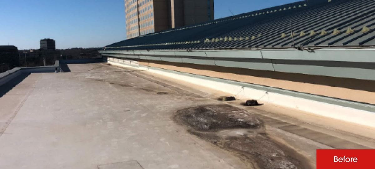 Damaged Convention Center roofin Kansas before new GAF commercial roofing material application