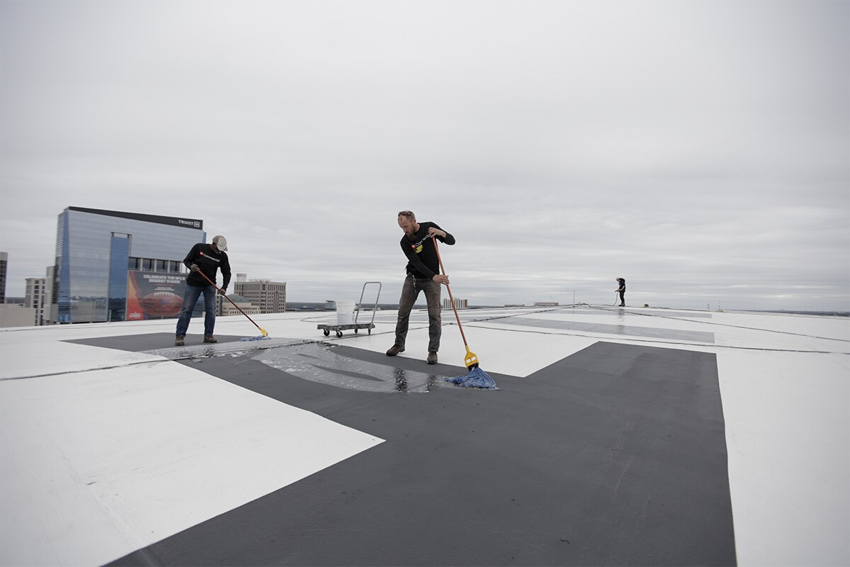 New roofing materials are being installed at the Kia Center in Orlando, FL.