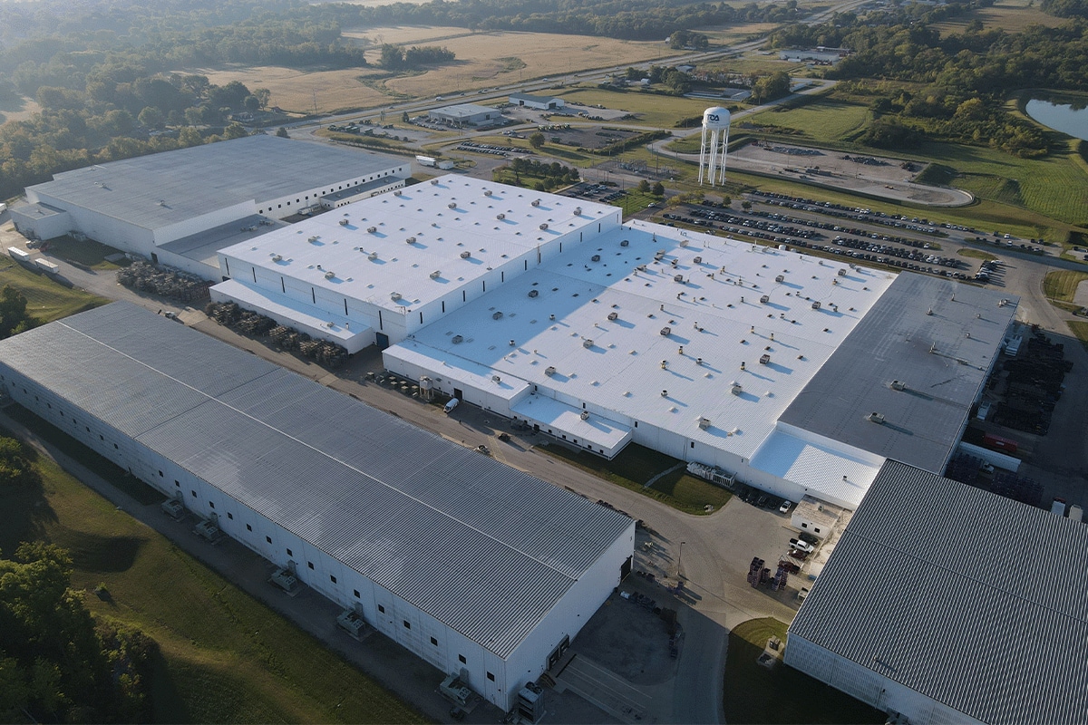 Top view of the TOA USA facility in IN with new silicone roof restored by GAF roof coating materials.