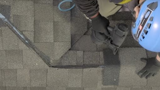 Video thumbnail for Installing ridge cap shingles at roof transitions