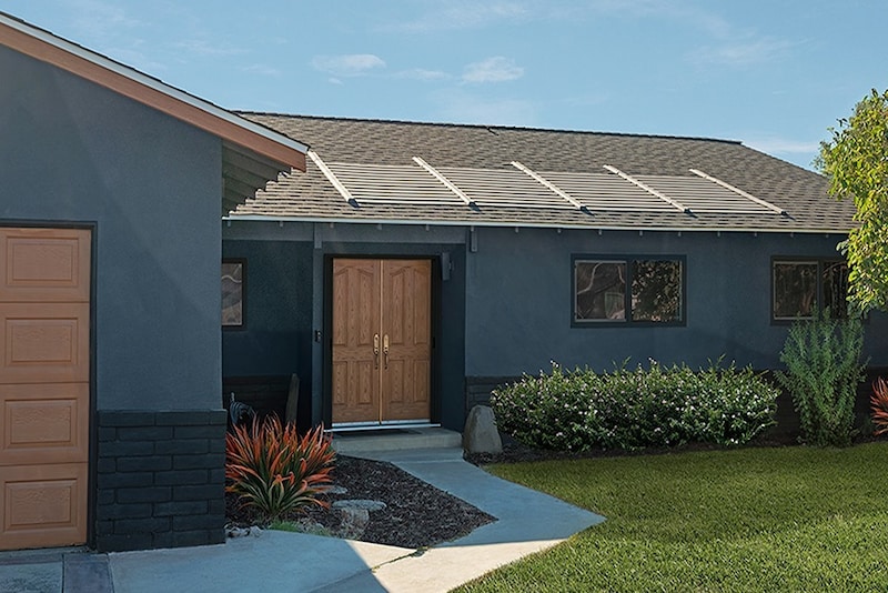 A house with a roof built with GAF Energy Timberline Solar Roofing shingles.