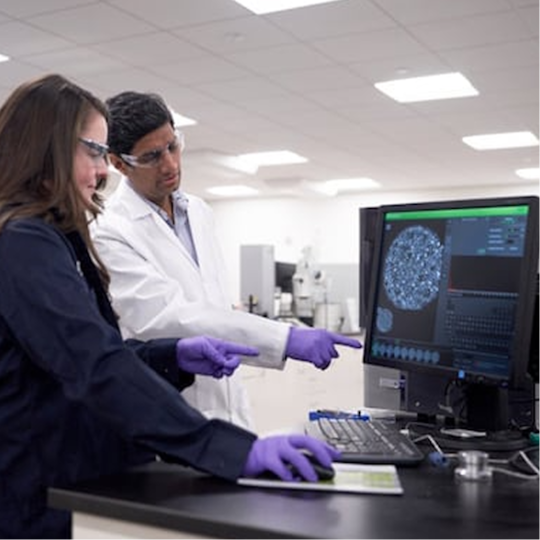 GAF lab technicians reviewing product composition