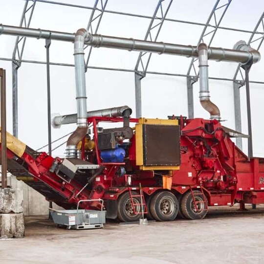 Machine recycling asphalt shingles