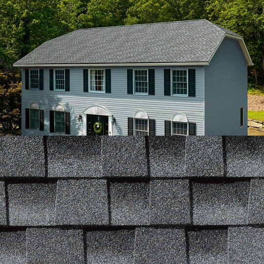 GAF Timberline HDZ® Pewter Gray Shingle closeup with sample product image on a light blue house