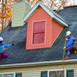 Highlighting a dormer roof on a home, which adds space and light to a top floor or attic.