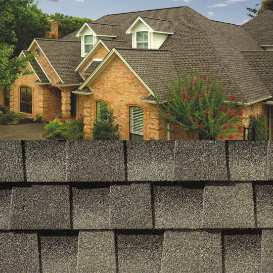 GAF Timberline HDZ®  Weathered Wood Shingle closeup with sample product image on a light brick house.