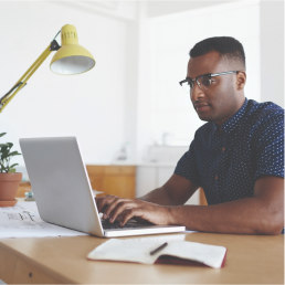 Man at desk on laptop