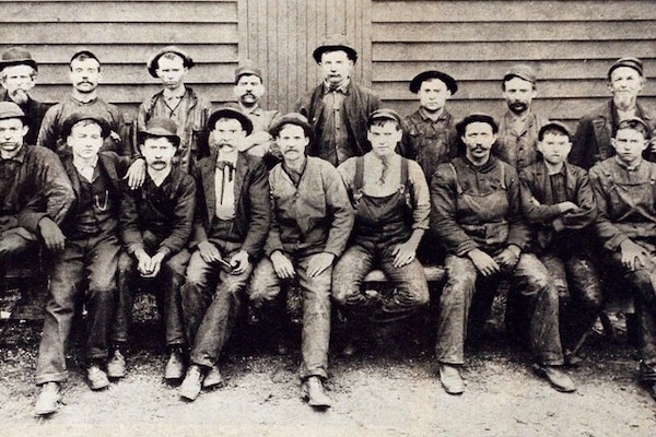 Historical photo of Standard Industries employees