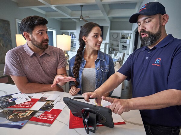 Homeowners reviewing residential warrenties