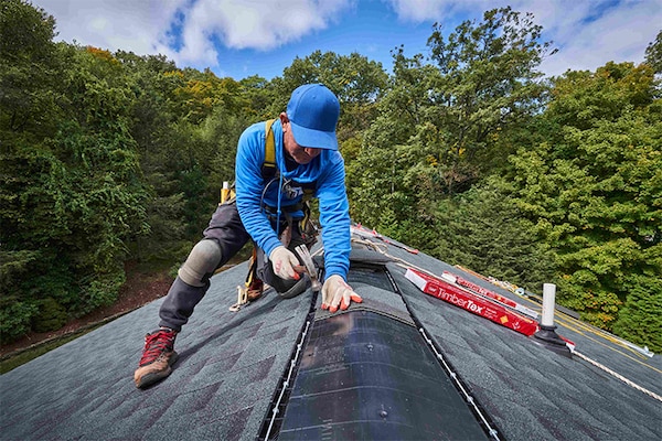A GAF-certified contractor installs GAF brand shingles on a roof