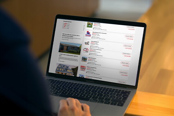 A homeowner browsing a directory page of roofing contractors 