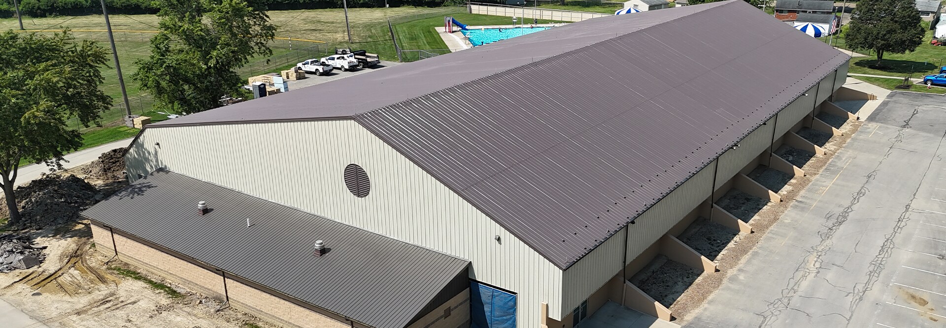 Side view of the new roof coating system from GAF that restored the roof of the North Park Ice Arena in Ohio.