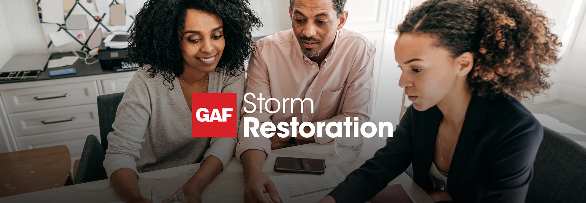 An insurance carrier representative and homeowners discuss how to handle a storm restoration claim after a storm.