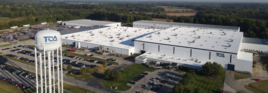 TOA USA facility in Mooresville, IN with a new GAF liquid-applied seamless silicone roof for long-term leak protection and elasticity to move with the building.