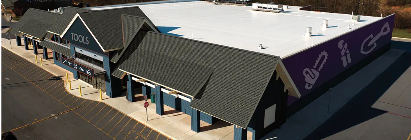 Flat roof with GAF coatings backed by guarantees