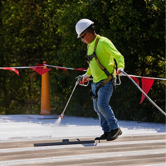 GAF certified contractor applying liquid roof coating