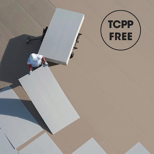GAF Energy employee installing TCPP free insulation