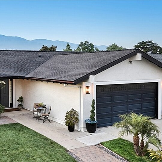 House with GAF reflective shingles on the roof