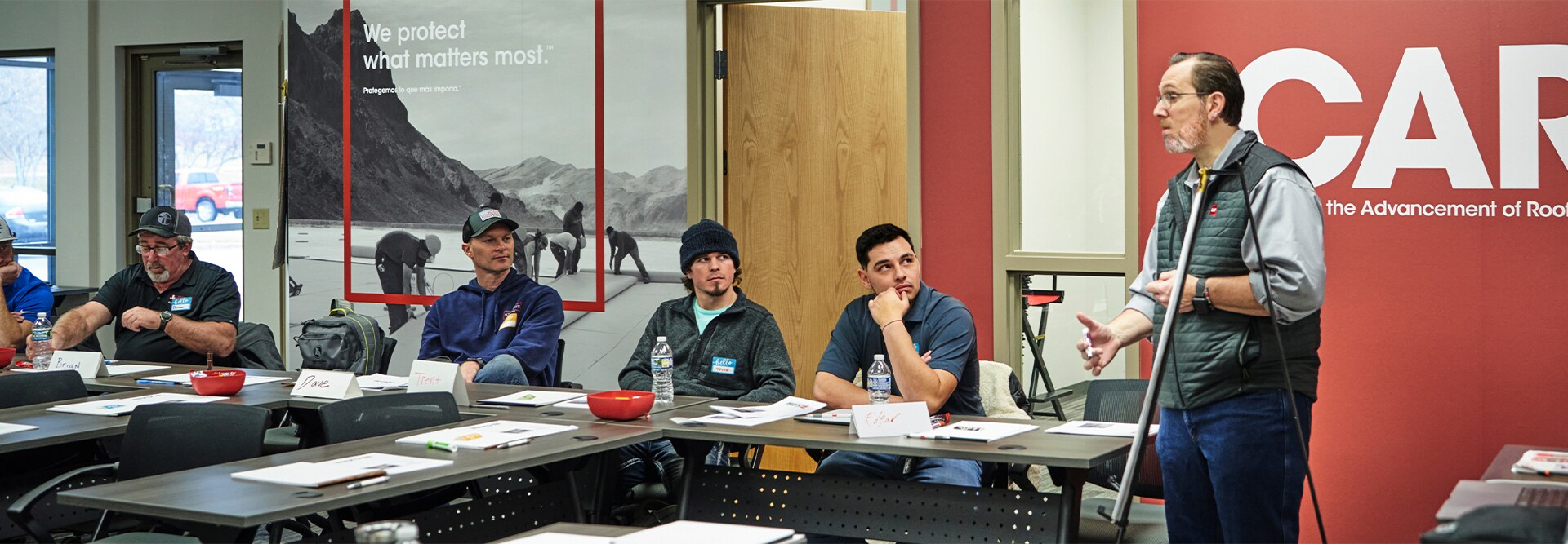 GAF CARE Contractor training center leading a roofing class