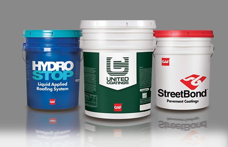 Buckets of Hydrostop, United Coatings, and StreetBond Pavement Coatings